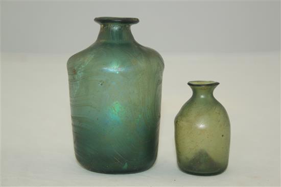 Two Roman glass bottles, c.2nd-4th century AD, 5.5 - 9.5cm